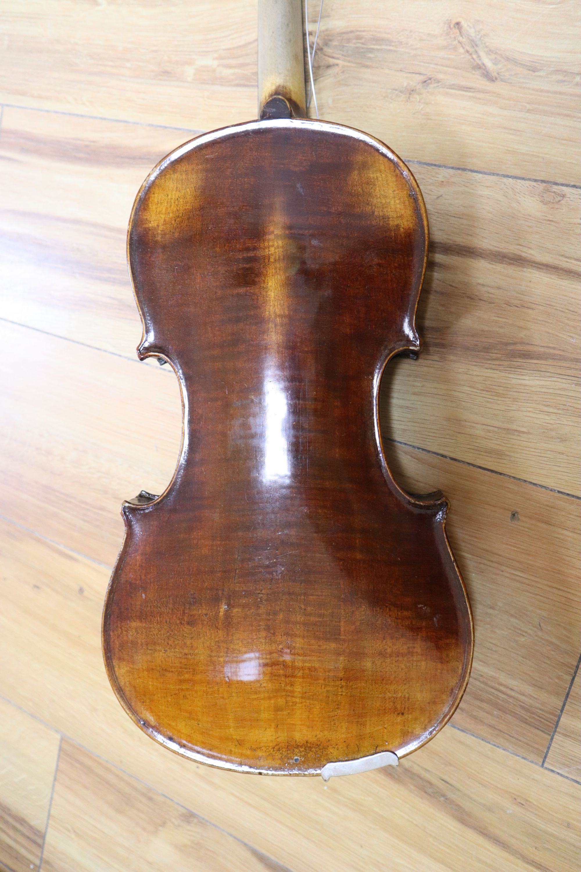 A violin labelled W Placht & Co, 58cm, cased